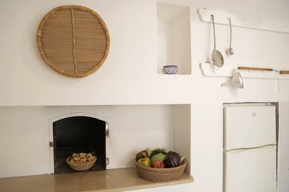 The wood-fired oven in the veranda kitchen