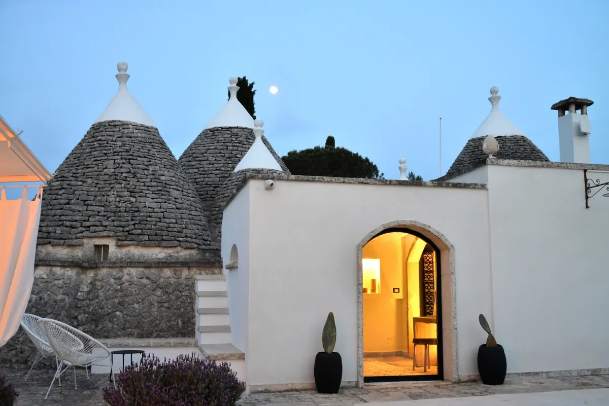 The lit entrance under the moon